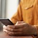 close-up-man-browsing-his-phone